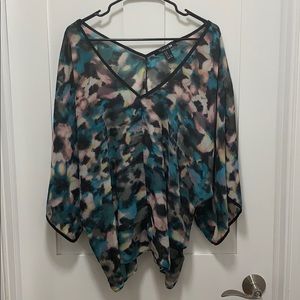 Silky material, 3/4 length sleeves